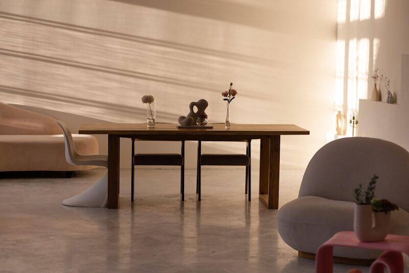 a living room filled with furniture and a table